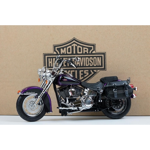 1043 - Two boxed Harley Davidson Diecast Promotions diecast models to include 81146 2011 H-D FLSTC Heritage... 