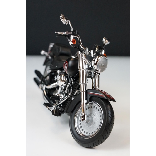 1043 - Two boxed Harley Davidson Diecast Promotions diecast models to include 81146 2011 H-D FLSTC Heritage... 