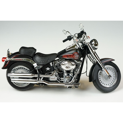 1043 - Two boxed Harley Davidson Diecast Promotions diecast models to include 81146 2011 H-D FLSTC Heritage... 