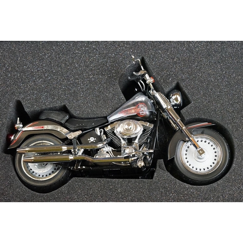 1043 - Two boxed Harley Davidson Diecast Promotions diecast models to include 81146 2011 H-D FLSTC Heritage... 