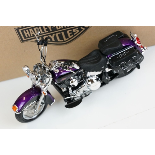 1043 - Two boxed Harley Davidson Diecast Promotions diecast models to include 81146 2011 H-D FLSTC Heritage... 