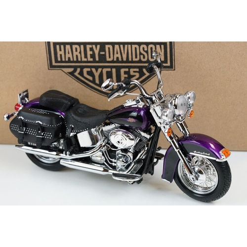 1043 - Two boxed Harley Davidson Diecast Promotions diecast models to include 81146 2011 H-D FLSTC Heritage... 