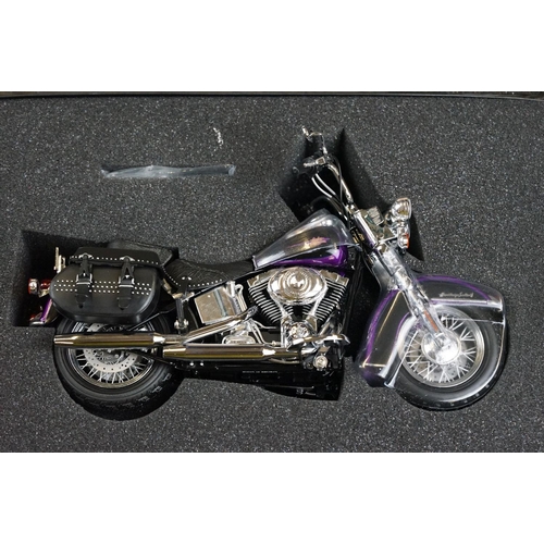 1043 - Two boxed Harley Davidson Diecast Promotions diecast models to include 81146 2011 H-D FLSTC Heritage... 