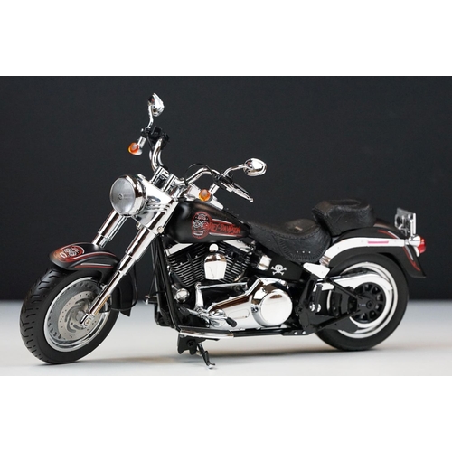 1043 - Two boxed Harley Davidson Diecast Promotions diecast models to include 81146 2011 H-D FLSTC Heritage... 