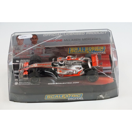 1054 - Three cased / boxed Scalextric Digital F1 slot cars to include C2676D Ferrari F2004 No1, C2715D Hond... 