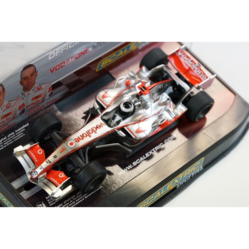 1054 - Three cased / boxed Scalextric Digital F1 slot cars to include C2676D Ferrari F2004 No1, C2715D Hond... 