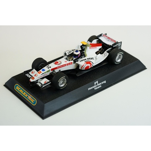 1054 - Three cased / boxed Scalextric Digital F1 slot cars to include C2676D Ferrari F2004 No1, C2715D Hond... 