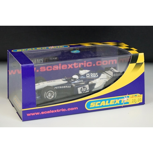 1055 - Five boxed / cased Scalextric slot cars to include C2667 McLaren Mercedes F1 MP4 16 No 10, C2677 Fer... 