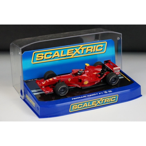 1056 - Six cased Scalextric F1 slot cars to include C3263 Mercedes GP Petronas 2012 Schumacher No 7, C3364 ... 