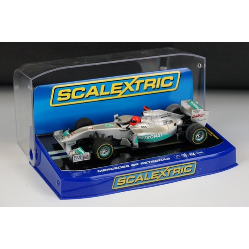 1056 - Six cased Scalextric F1 slot cars to include C3263 Mercedes GP Petronas 2012 Schumacher No 7, C3364 ... 