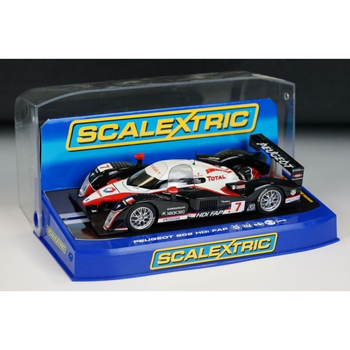 1057 - Six cased Scalextric slot cars to include C3080 Ferrari F430 GT2 Krohn Racing ,C2644D Aston Martin D... 