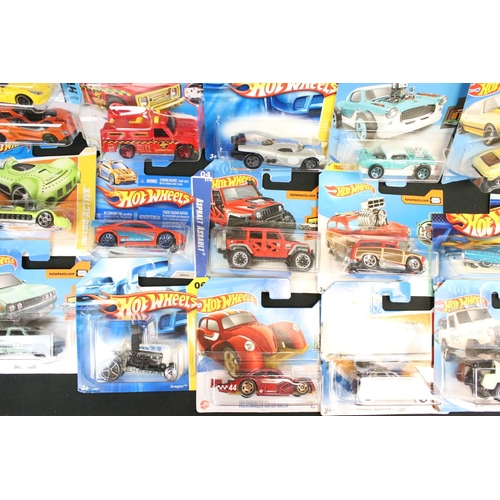 1085 - Around 80 carded Mattel Hot Wheels diecast models, featuring Ghostbusters, HW Race, HW City, 2008 Fi... 