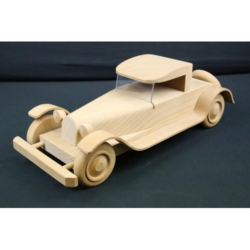 1114 - Two Michel Aroutcheff (France) hand built wooden toy cars, ex