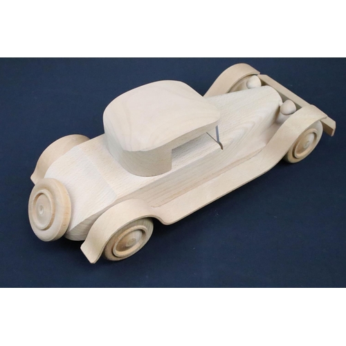 1114 - Two Michel Aroutcheff (France) hand built wooden toy cars, ex