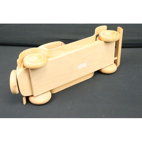 1114 - Two Michel Aroutcheff (France) hand built wooden toy cars, ex