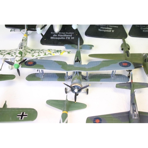 1144 - 30 Atlas Editions military aircraft diecast models, with a quantity of associated stands, featuring ... 