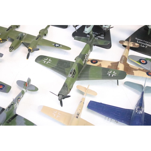 1144 - 30 Atlas Editions military aircraft diecast models, with a quantity of associated stands, featuring ... 