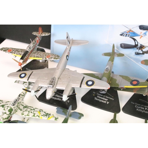 1144 - 30 Atlas Editions military aircraft diecast models, with a quantity of associated stands, featuring ... 