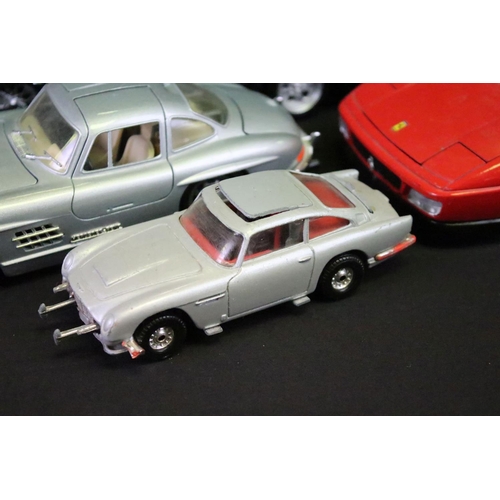 1150 - 14 diecast models, of varying scales, to include Maisto, Corgi, Burago, Knight & Welly examples, fea... 