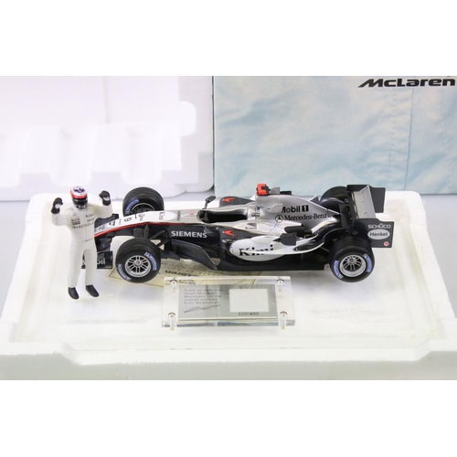 1179 - Three boxed 1/18 F1 diecast models to include 2 x Paul's Model Art Minichamps McLaren Collection (4/... 