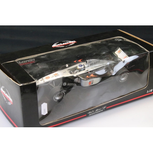 1179 - Three boxed 1/18 F1 diecast models to include 2 x Paul's Model Art Minichamps McLaren Collection (4/... 