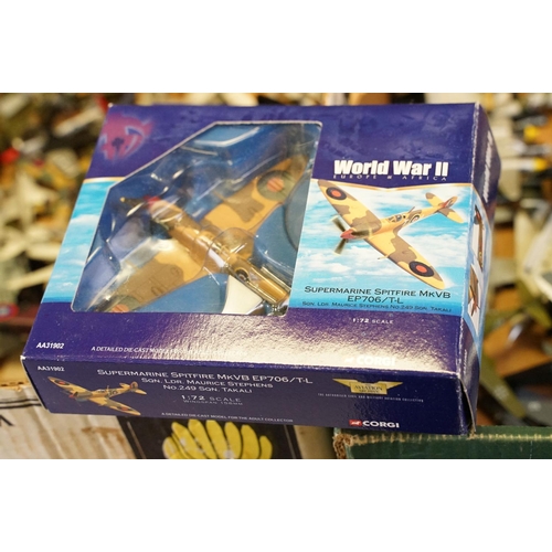 1215 - Over 50 diecast model planes with corresponding plastic stands plus a boxed Corgi Aviation Archive W... 