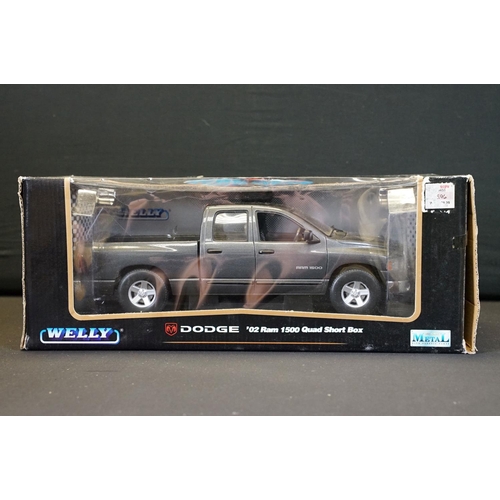 1239 - Nine boxed 1/10 - 1/24 diecast models to include Welly Dodge 02 Ram 1500 Quad Short Box, and 8 x Mai... 