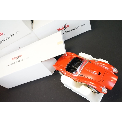 1239 - Nine boxed 1/10 - 1/24 diecast models to include Welly Dodge 02 Ram 1500 Quad Short Box, and 8 x Mai... 