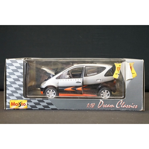 1239 - Nine boxed 1/10 - 1/24 diecast models to include Welly Dodge 02 Ram 1500 Quad Short Box, and 8 x Mai... 