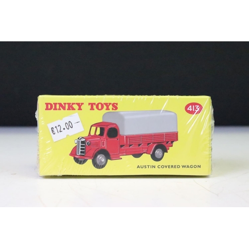 1258 - Four sealed boxed Atlas Dinky diecast models and set to include 593 Road Signs, 512 Guy Flat Truck, ... 