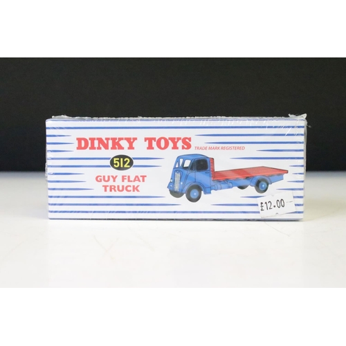 1258 - Four sealed boxed Atlas Dinky diecast models and set to include 593 Road Signs, 512 Guy Flat Truck, ... 