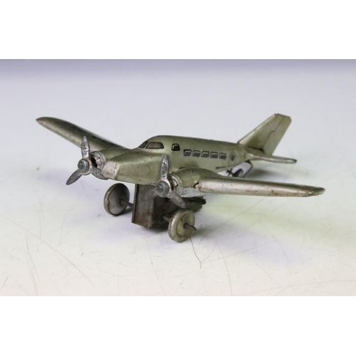 1266 - Five tin plate & plastic models to include 1930/40s Hammerer & Kuhlwein TRO345 plane, Japanese batte... 