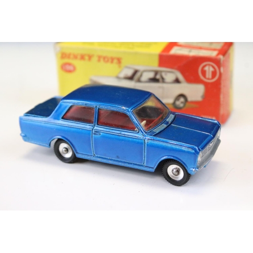 1398 - Four boxed Dinky diecast models to include 136 Vauxhall Viva in metallic blue, 165 Ford Capri with S... 