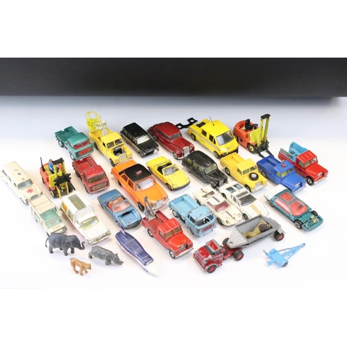 1401 - Around 25 mid 20th C onwards play worn diecast models to include Corgi and Dinky featuring Corgi Ken... 