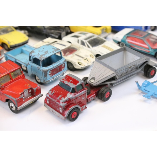 1401 - Around 25 mid 20th C onwards play worn diecast models to include Corgi and Dinky featuring Corgi Ken... 