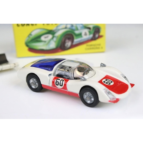 1488 - Two boxed Corgi diecast models to include 330 Porsche Carrera 6 in white with red, race number 30, a... 