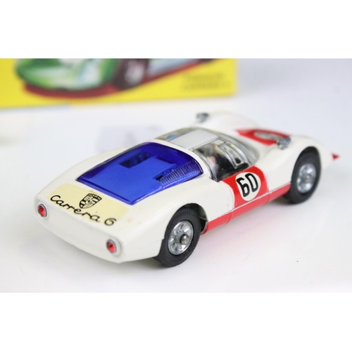 1488 - Two boxed Corgi diecast models to include 330 Porsche Carrera 6 in white with red, race number 30, a... 