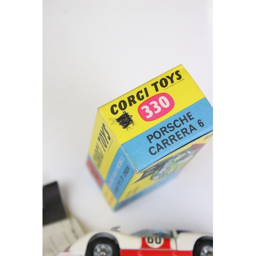 1488 - Two boxed Corgi diecast models to include 330 Porsche Carrera 6 in white with red, race number 30, a... 