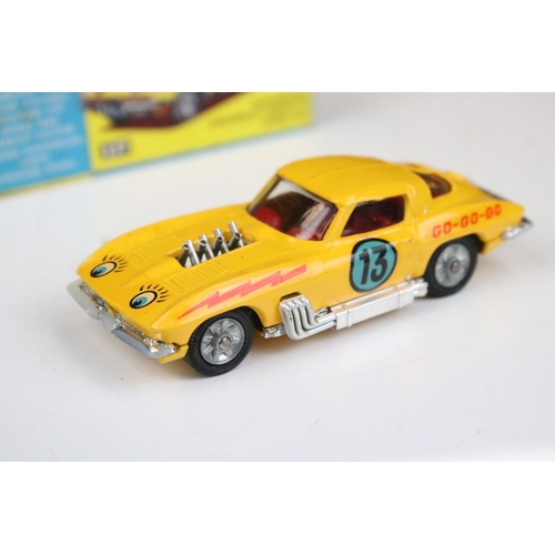 1488 - Two boxed Corgi diecast models to include 330 Porsche Carrera 6 in white with red, race number 30, a... 