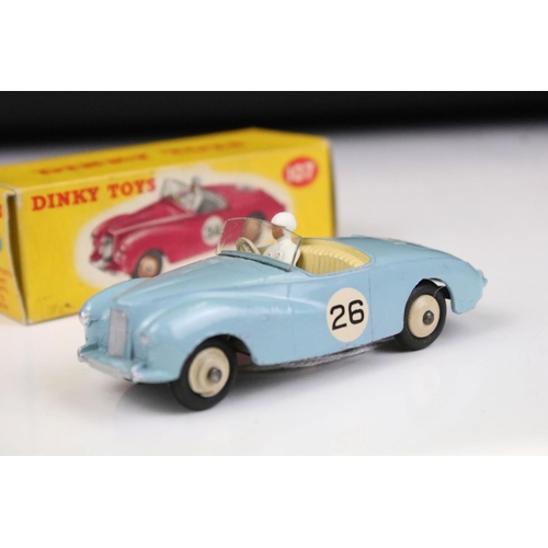 1495 - Three boxed Dinky diecast models to include 107 Sunbeam Alpine Sports in pale blue, 110 Aston Martin... 