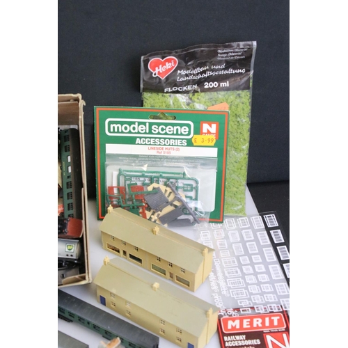 153 - Collection of boxed, carded and unboxed N gauge trackside and scenery accessories to include buildin... 