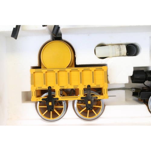 156 - Hornby Railways Stephenson Rocket Real Steam Train set includes engine, gas fuel tank and track. Con... 