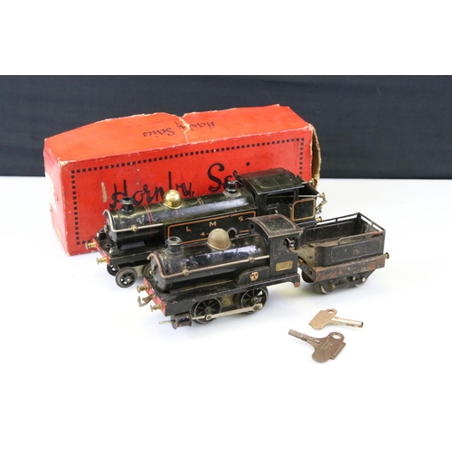 159 - Boxed Hornby O gauge 35241 No 2 Tank Loco LMS black locomotive with key and a MLL 0-4-0 2710 locomot... 