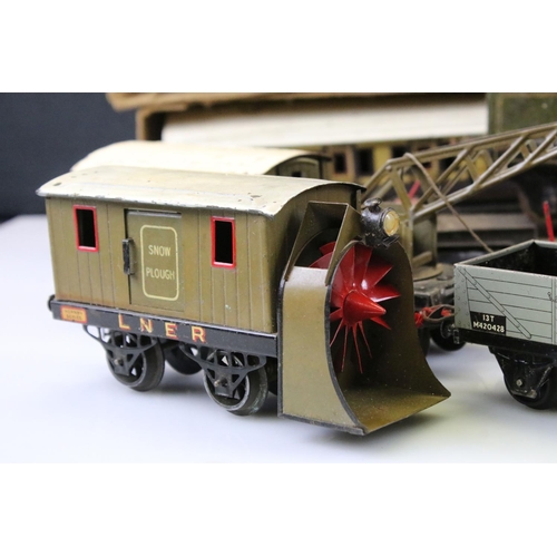 160 - Around 20 early 20th C items of rolling stock to include Bing, Hornby and MLL featuring coaches, wag... 