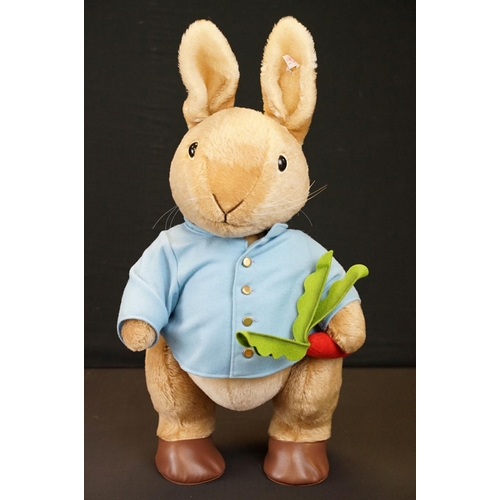 231 - Steiff - Bagged Steiff Peter Rabbit teddy, No. 690334, approximately 55cm from feet to ear, button a... 