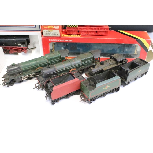 31 - Group of OO gauge model railway to include locomotives, track, spares and repairs, features a KTM Ja... 