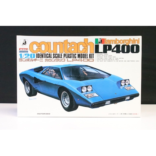 334 - Four boxed ARII 1/20 plastic model car kits to include AR63A Countach Lamborghini LP500S, AR63B Ferr... 