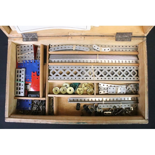 353 - Meccano - Wooden box of items and accessories to include wheels, ephemera, motor etc plus a boxed 3A... 