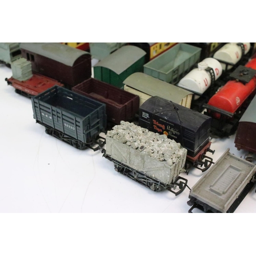 42 - Around 50 OO gauge items of rolling stock to include Triang, Hornby etc featuring coaches, wagons, v... 