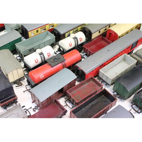 42 - Around 50 OO gauge items of rolling stock to include Triang, Hornby etc featuring coaches, wagons, v... 